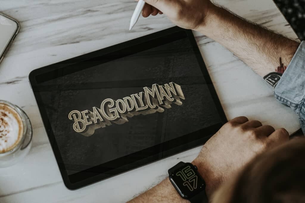 A tablet on a marble table showing the Be a Godly Man series