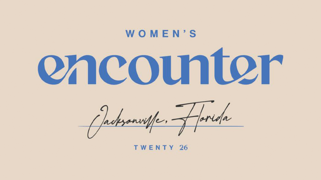 Women's Encounter event logo featuring "Women's Encounter" in bold blue letters, "Jacksonville, Florida" in elegant script, and "Twenty 26" below, set against a soft beige background.